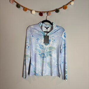 Ace Golfs patterned blue floral golf quarter zip top